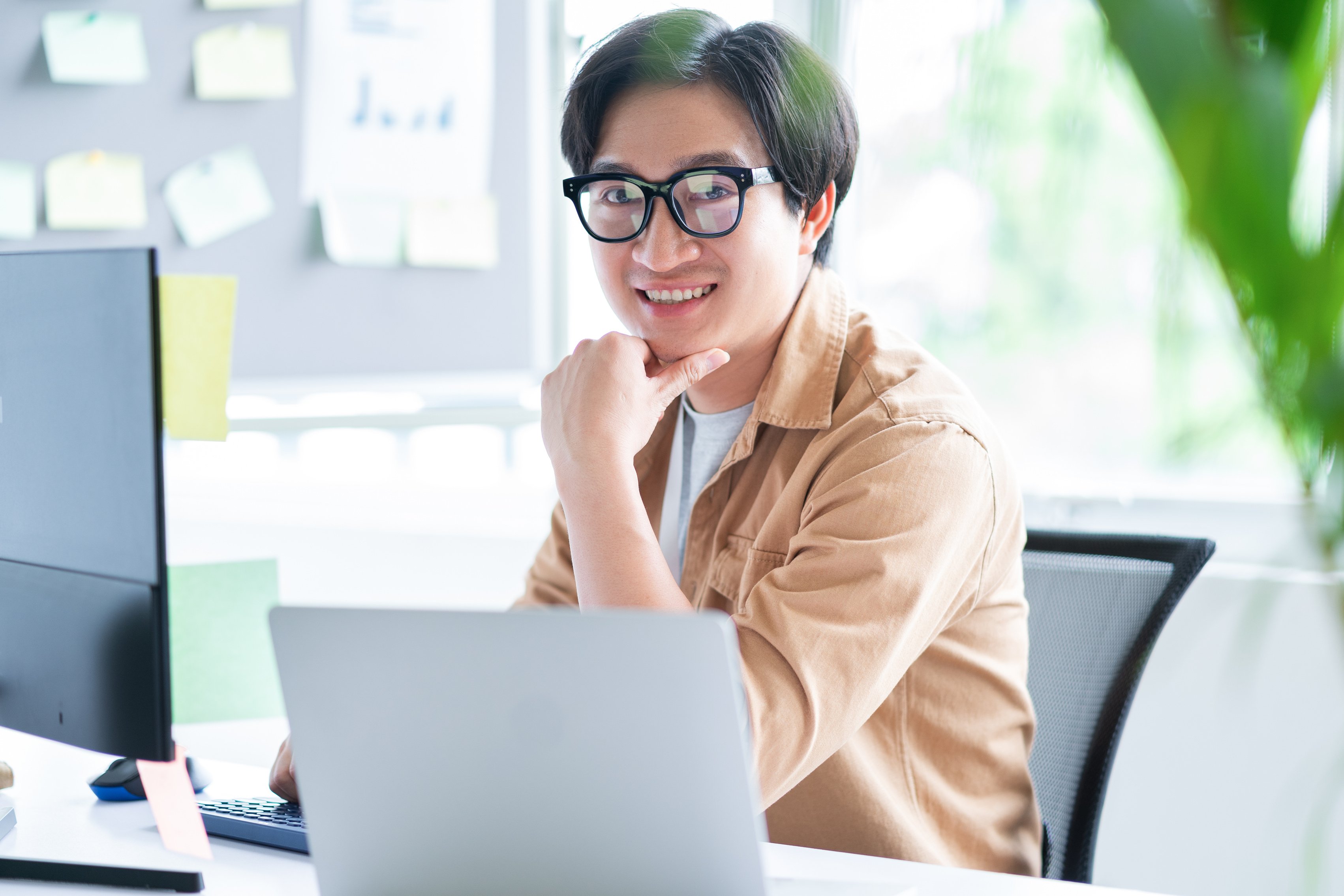 Business Male Working with Computer in Office